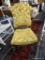 SINGLE SEAT CHAIR; SINGLE SEAT CHAIR WITH A GREEN AND ORANGE LEAF DETAILED FABRIC AROUND THE SEAT
