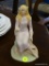 LASZLO ISPANKY FOUR SEASONS FIGURINE; SPRING LADY FOUR SEASONS FIGURINE FINE PORCELAIN. MEASURES 7