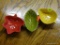 SET OF SAUCE DISHES; SET OF 3 LEAF SHAPED GLAZED CERAMIC SAUCE/DIP DISHES. INCLUDES YELLOW, RED, AND