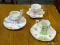 SET OF SHASHI CHINA TEACUPS; 3 PIECE SET OF SHASHI CHINA PORCELAIN TEACUPS AND SAUCERS.