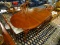 DINING TABLE AND CHAIRS; DROP LEAF DINING TABLE WITH SCALLOPED EDGES. EACH OF THE FOUR QUEEN ANNE