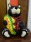 BEAR COOKIE JAR; GLAZED BLACK BEAR WEARING A PLAID SHIRT AND HOLDING A FISH. MEASURES 11 IN TALL.