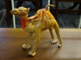 LEATHER CAMEL; LEATHER CAMEL WITH A YARN SADDLE. MEASURES 6 IN H X 6 IN L.