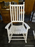 OUTDOOR ROCKING CHAIR; WHITE WOODGRAIN OUTDOOR PORCH ROCKING CHAIR WITH BANNISTER BACKS. MEASURES 31