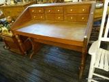 CEDAR WORKERS DESK; CEDAR WOODEN WORKERS DESK WITH 6 DRAWERS ON THE TABLE TOP WITH WHITE KNOBS. SITS