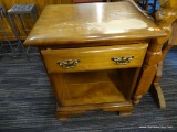 WOODEN SIDE TABLE; OAK SIDE TABLE WITH A ROUND EDGED TABLE TOP. HAS A DRAWER BELOW THE TABLE TOP