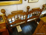 OAK GLIDEAWAY BED CARRIAGE BED FRAME; OAK BED FRAME WITH TAPERED POLES ON THE CORNERS AND A TAPERED