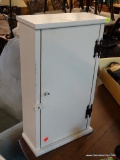 SMALL WHITE CABINET; SMALL WHITE WOODEN CABINET WITH A PLASTIC KNOB AND A LOCKING LATCH. DOOR OPENS