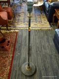 METAL FLOOR LAMP; METAL FLOOR LAMP WITH A TAPERED FADED POLE. MEASURES 48 IN TALL.