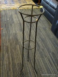 WROUGHT IRON PLANT STAND; BLACK WROUGHT IRON PLANT STAND WITH ROUND FLOWER POT HOLDER. MEASURES 2 FT