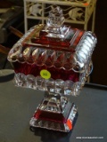 RUBY AND CLEAR GLASS COMPOTE; LIDDED CLEAR GLASS COMPOTE WITH RUBY STRIPES. MEASURES 5.5 IN X 5.5 IN