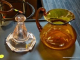 GLASSWARE LOT; 2 PIECE LOT TO INCLUDE A BLOWN GLASS ORANGE COLORED PITCHER,AND A PINK DEPRESSION