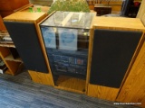 YAMAHA STEREO AND CABINET; WOODGRAIN STEREO CABINET WITH GLASS TOP AND FRONT DOOR. COMES WITH 2