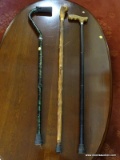 LOT OF ASSORTED CANES; 3 PIECE LOT TO INCLUDE A NATURAL WOOD CANE/WALKING STICK, A GREEN MARBLED