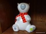 POLAR BEAR COIN BANK; WHITE POLAR BEAR WITH RED AND ORANGE SCARF. HAS COIN SLOT ON THE BACK.