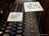 PAIR OF PLANT STANDS; PAIR OF WHITE SCROLLING METAL PLANT STANDS WITH TILE TOPS THAT HAVE CARVED