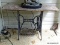 (PORCH) TABLE; CAST IRON AND MARBLE TOP TABLE- TABLE BASE ONCE WAS A PART TO A SEWING CABINET-