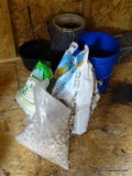 (SHED) MISCELL. LOT; LOT INCLUDES PARTIAL BAG OF RIVER ROCK, OPENED BAG OF FERTILIZER, PARTIAL BAG