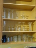 (KIT) CABINET LOT; LOT INCLUDES VARIOUS SIZES OF CRYSTAL STEMWARE, ICE TEA GLASSES, WATER GLASSES,