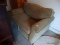 (GARAGE) LOVESEAT; GOLD UPHOLSTERY LOVESEAT SLEEPER SOFA- SHOWS WEAR- 54 IN X 36 IN X 36 IN