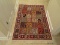 (HALL) ORIENTAL RUG; MACHINE MADE ORIENTAL BAKHTIARI RUG IN RED, IVORY AND MULTI- COLORS IN