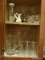 (KIT) CABINET LOT OF ASSORTED GLASSES; LOT INCLUDE A FLORAL GLASS WATER PITCHER, 4 MARTINI GLASSES,