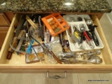 (KIT) DRAWER LOT; LOT INCLUDES ASSORTED UTENSILS SUCH AS TONGS, SCOOPS, KNIVES, AND SPREADERS.