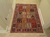 (HALL) ORIENTAL RUG; MACHINE MADE ORIENTAL BAKHTIARI RUG IN RED, IVORY AND MULTI- COLORS IN