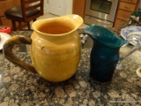 (KIT) SET OF PITCHERS; 2 PIECE LOT TO INCLUDE A WOODEN PITCHER AND A TEAL BLUE FLORAL PITCHER WITH