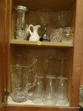 (KIT) CABINET LOT OF ASSORTED GLASSES; LOT INCLUDE A FLORAL GLASS WATER PITCHER, 4 MARTINI GLASSES,