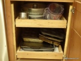 (KIT) CABINET LOT; LOT INCLUDES PLASTIC MEASURING CUPS, A BUNDT PAN, LOAF PANS, A CHEESE GRATER,