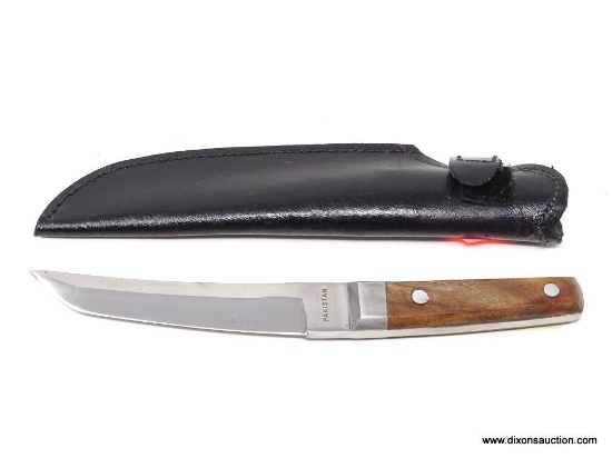 SMALLER POCKET KNIFE; SMALLER PAKISTAN POCKET KNIFE IN A BLACK LEATHER SHEATH. MEASURES 8 IN.