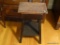 (DR) WOODEN STOOL; WOOD GRAIN STOOL WITH A LOWER SHELF AND 4 SQUARE LEGS. THE SEAT ISN'T ATTACHED.