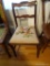 (DR) LADDERBACK CHAIR; WOOD GRAIN LADDER BACK CHAIR WITH A FLOWER CARVED TOP, BEIGE CUSHIONED SEAT