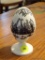 (DR) BONE CHINA EGG AND STAND; CROWN STAFFS ENGLAND WHITE EGG AND BASE WITH BLACK GIRAFFES PAINTED