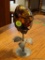 (DR) LARGE GLASS EGG ON METAL STAND; AMBER AND BROWN ITALIAN BLOWN GLASS EGG SITTING IN A METAL
