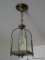 (FOY) HANGING LIGHT FIXTURE; BRASS LIGHT FIXTURE WITH ETCHED FLORAL GLASS PANELS. THE INSIDE HOLDS 2