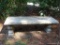 (OUT) CONCRETE OUTDOOR BENCH; OUTDOOR 3 PIECE CONCRETE BENCH. HAS CARVED DETAILING. MEASURES 4 FT 8