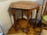 (DR) OAK SIDE TABLE; HEXAGON SHAPED TABLE WITH TRIANGLE PANELED WOOD ON THE TABLE TOP. TABLE SITS 6