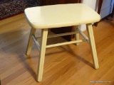 (DR) CREAM PAINTED WOOD STOOL; WOOD GRAIN STOOL PAINTED CREAM WITH AN H STRETCH AND 4 SQUARE LEGS.
