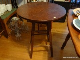 (DR) ROUND SIDE TABLE; ROUND WOOD GRAIN SIDE TABLE WITH A ROUND TABLE TOP AND 4 REEDED LEGS WITH 2