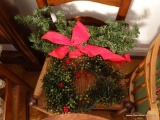 (DR) EVERGREEN WREATH; CHRISTMAS WREATH WITH RED RIBBONS AND CRANBERRIES SPREAD THROUGHOUT THE