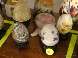 (DR) LOT OF DECORATIVE EGGS; 5 PIECE LOT OF MARBLE EGGS. INCLUDES 2 FLORAL, A TAN MARBLE, ONE WITH A