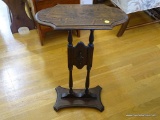 (FOY) MAHOGANY STAND; TOP SITS ON 2 REEDED AND SPINDLE LEGS WITH A CARVED DIAMOND IN THE CENTER.