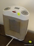 (OFC) HOLMES SPACE HEATER; WHITE HOLMES CERAMIC HEATER WITH FAN SELECTOR AND TEMPERATURE CONTROL.