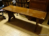 (DEN) WOODEN BENCH; DARK STAINED WOOD BENCH WITH ARCHED LEGS. MEASURES 4 FT X 1 FT 3.5 IN X 1 FT 6.5
