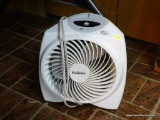 (DNRM) HOLMES SPACE HEATER; WHITE HOLMES 1 TOUCH HEATER. MODEL NO. HFH298. MEASURES 9.5 IN TALL.