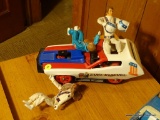 (DEN) LOT OF EVEL KNIEVEL CAR AND ACTION FIGURES; 5 PIECE LOT OF EVEL KNIEVEL FIGURINES TO INCLUDE 1