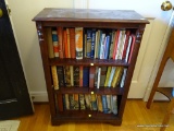 (FOYER) CHERRY BOOKCASE; WOODEN BOOKCASE WITH 3 SHELVES. HAS REEDED PILAR DETAILED SIDES AND 2