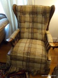 (LR) WINGBACK RECLINING CHAIR; RECLINING ROCKING CHAIR WITH A WINGBACK AND A LIGHT BROWN PLAID